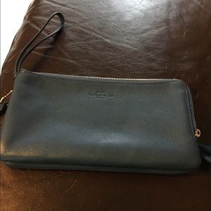 Large blue Coach wristlet.